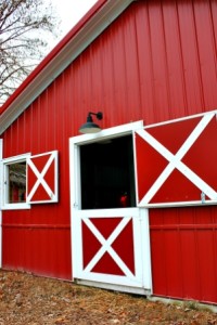 bigstock-Large-red-barn-with-an-open-ha-56693594