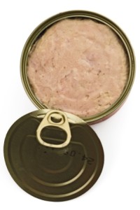 an open can of spam on white